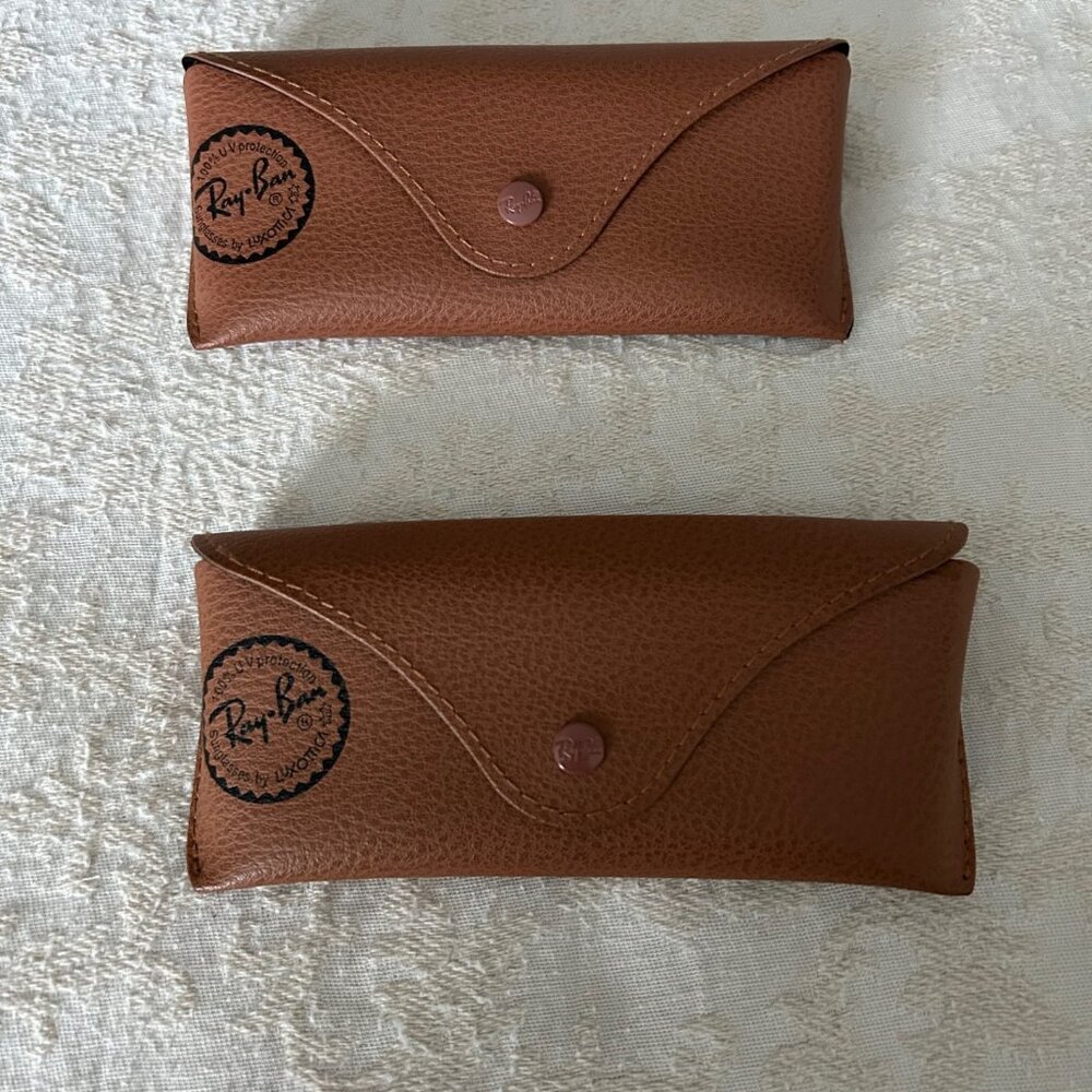 Two Ray-Ban sunglasses cases